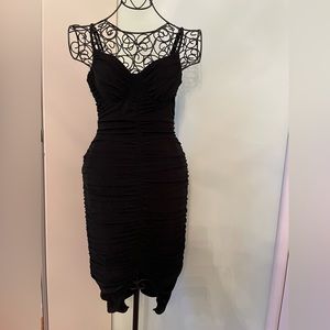 Lulu’s ruched body shimmer jersey black midi dress